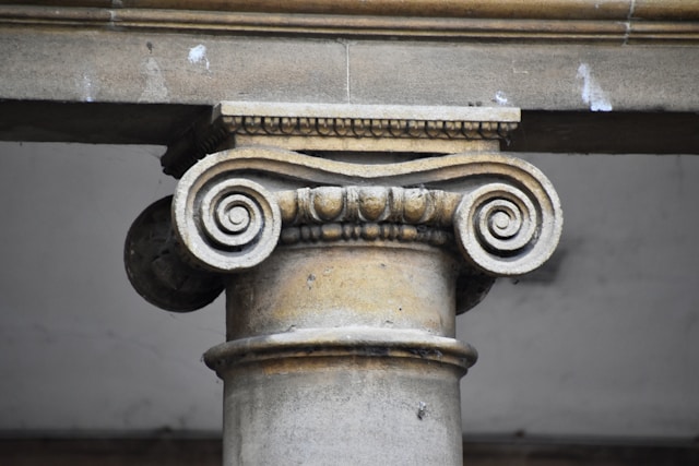 A close up of a historical architectural column.